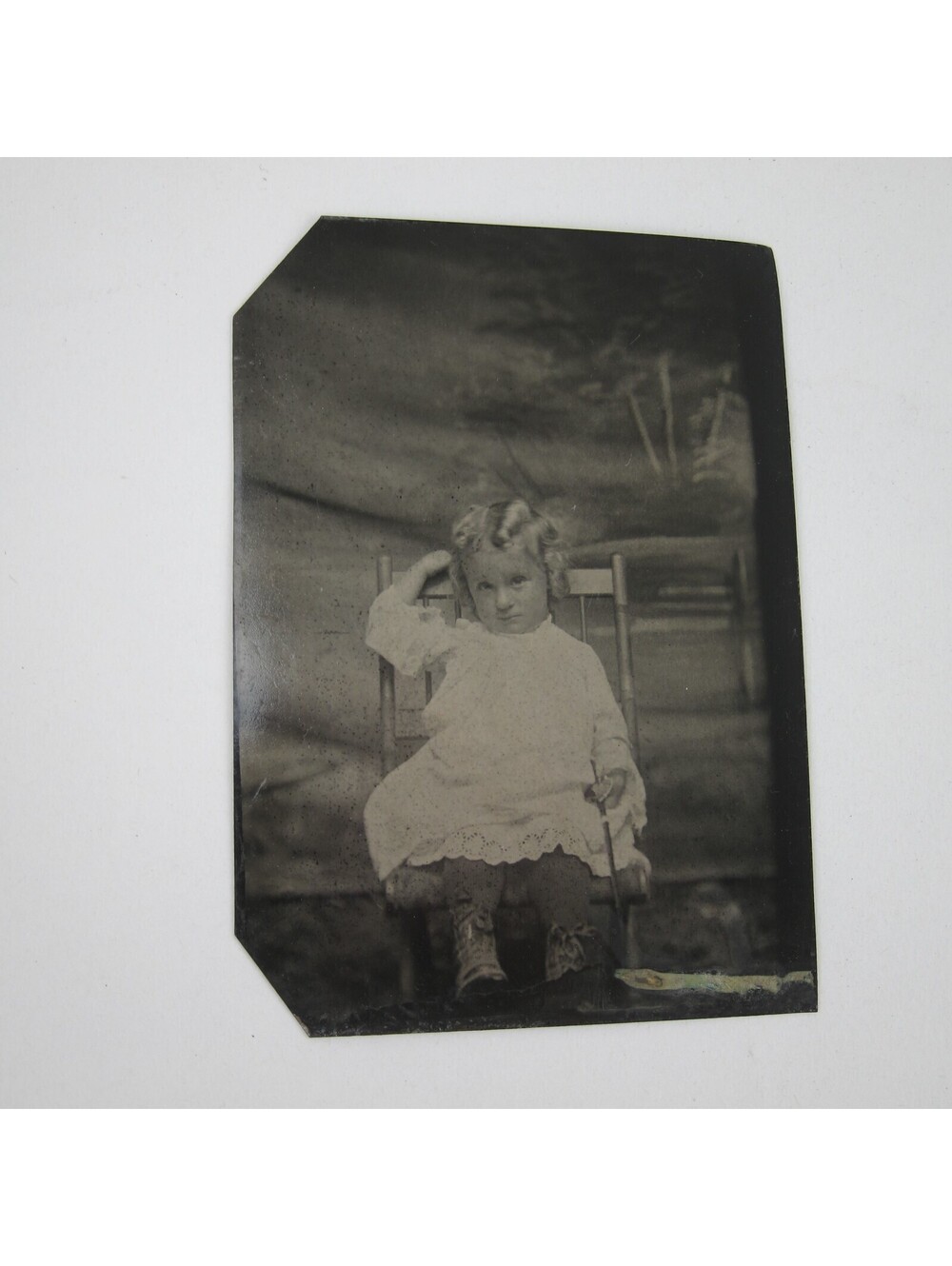 Tintype Photo Young Child Blonde Curls Sits in Chair Pouting Face Antique